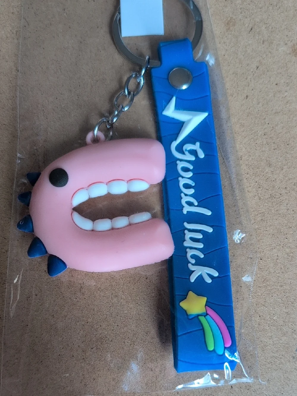 Pink Dino Keychain Charm with Blue 'Good Luck' Strap